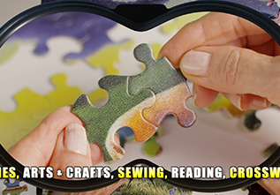 Person putting two puzzle pieces together